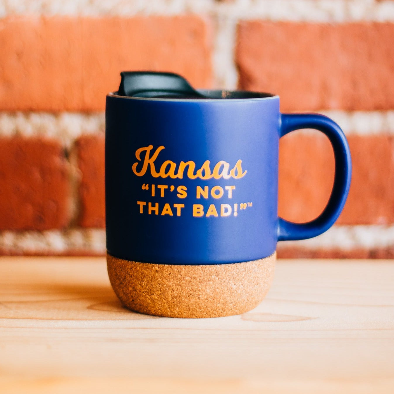 Kansas "It's Not That Bad!" Cork Bottom Travel Mug